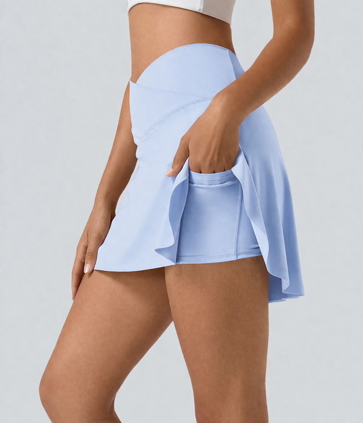 Falda Luna — Mini Deportiva Crossover 2 en 1 Cintura cruzada · Con bolsillo oculto · Ajuste favorecedor